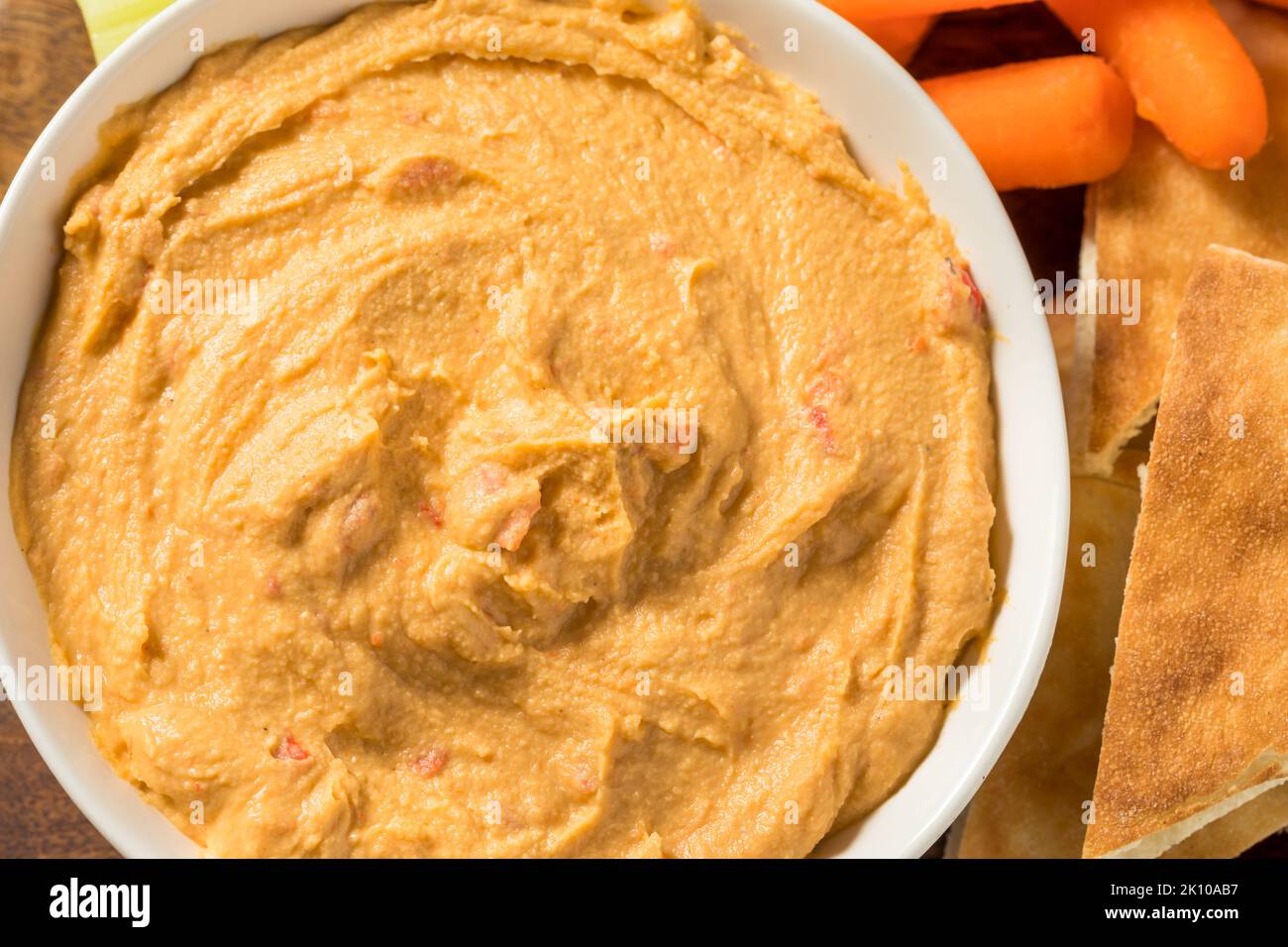 Homemade Red Pepper Hummus Dip with PIta and Veggies Stock Photo Alamy