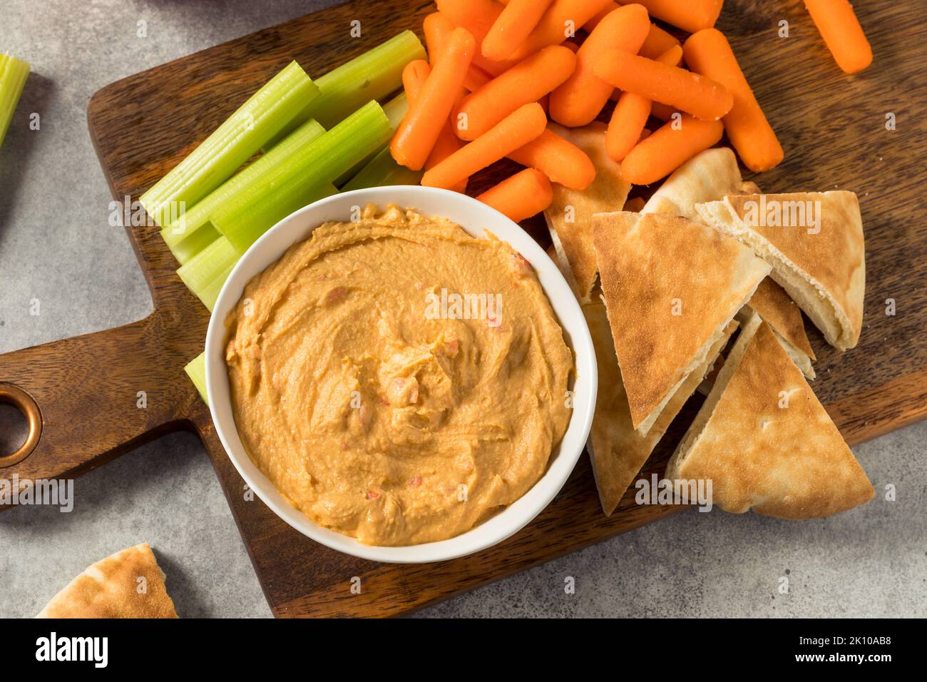 Homemade Red Pepper Hummus Dip with PIta and Veggies Stock Photo Alamy