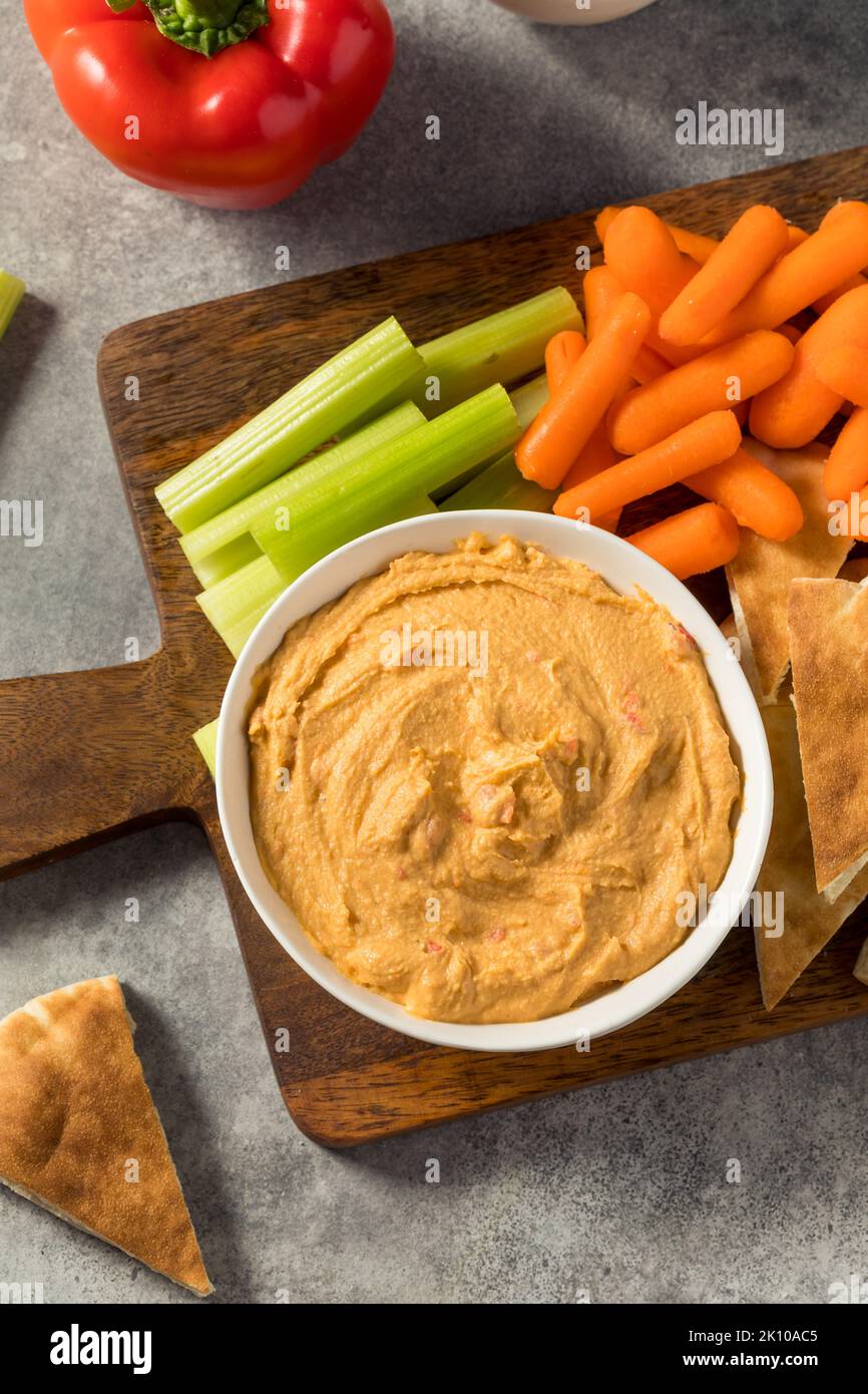 Homemade Red Pepper Hummus Dip with PIta and Veggies Stock Photo Alamy