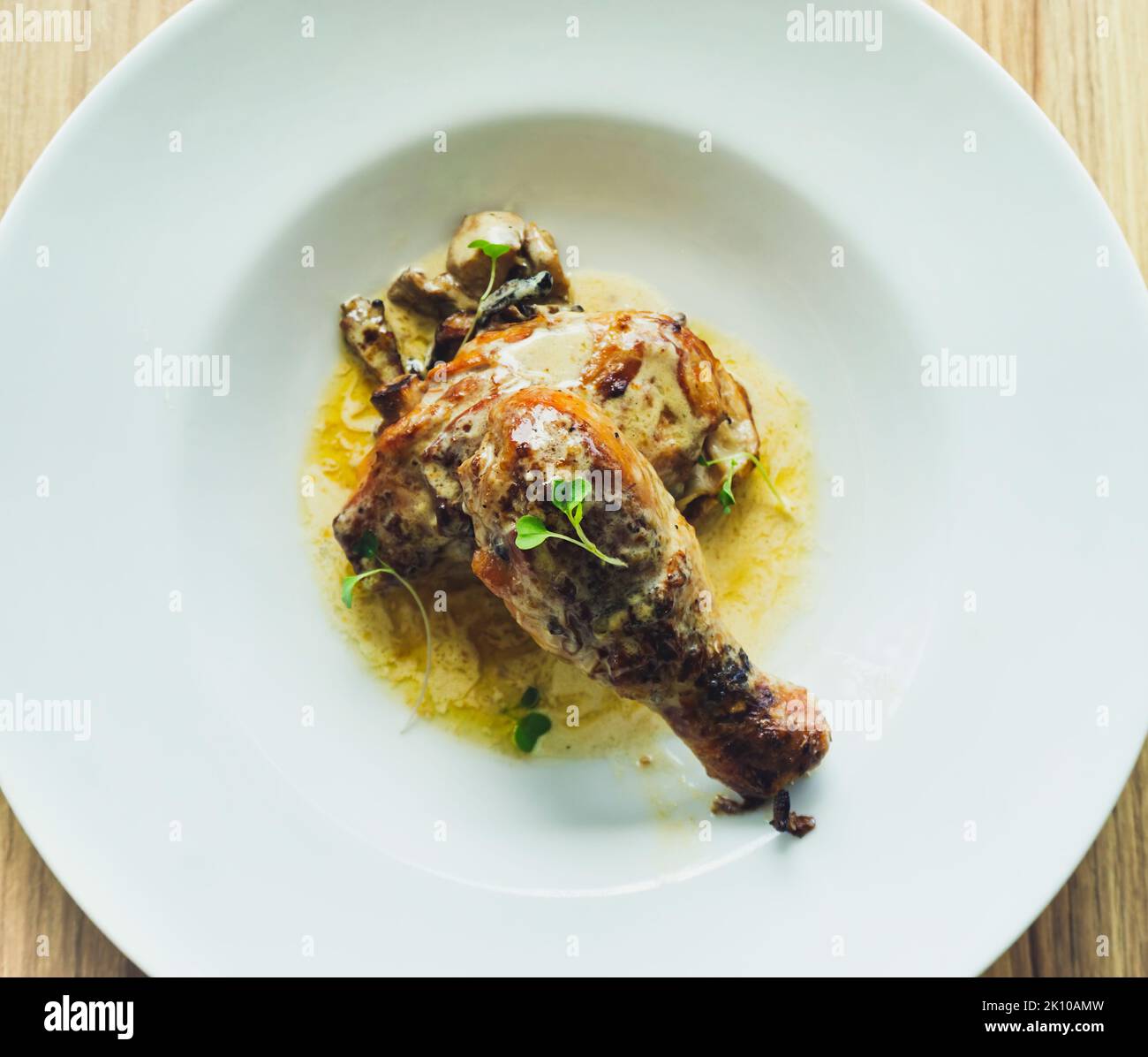 Truffle chicken with mushrooms (boletus edulis) and golden chanterelle