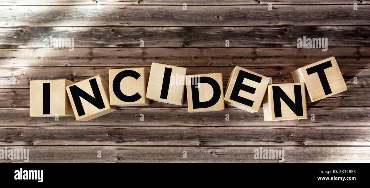 INCIDENT word made with wooden building block. Insurance concept. Stock Photo