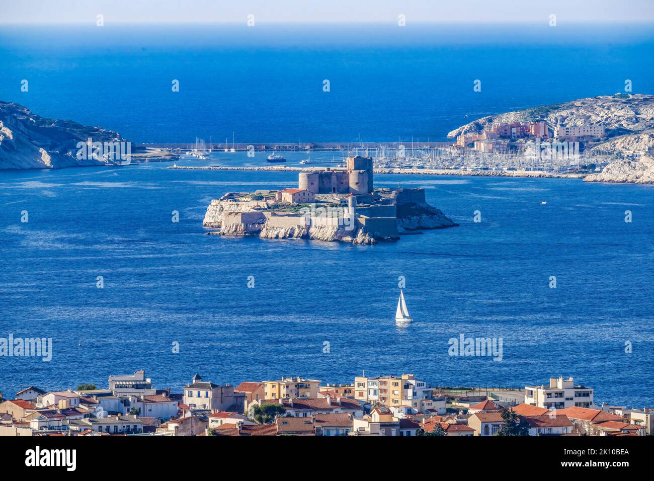 Island Fort Marseille Cityscape Overview Harbor Breakwater Apartment Buildings Marseille Cote d'Azur France. View from Notre Dame Stock Photo