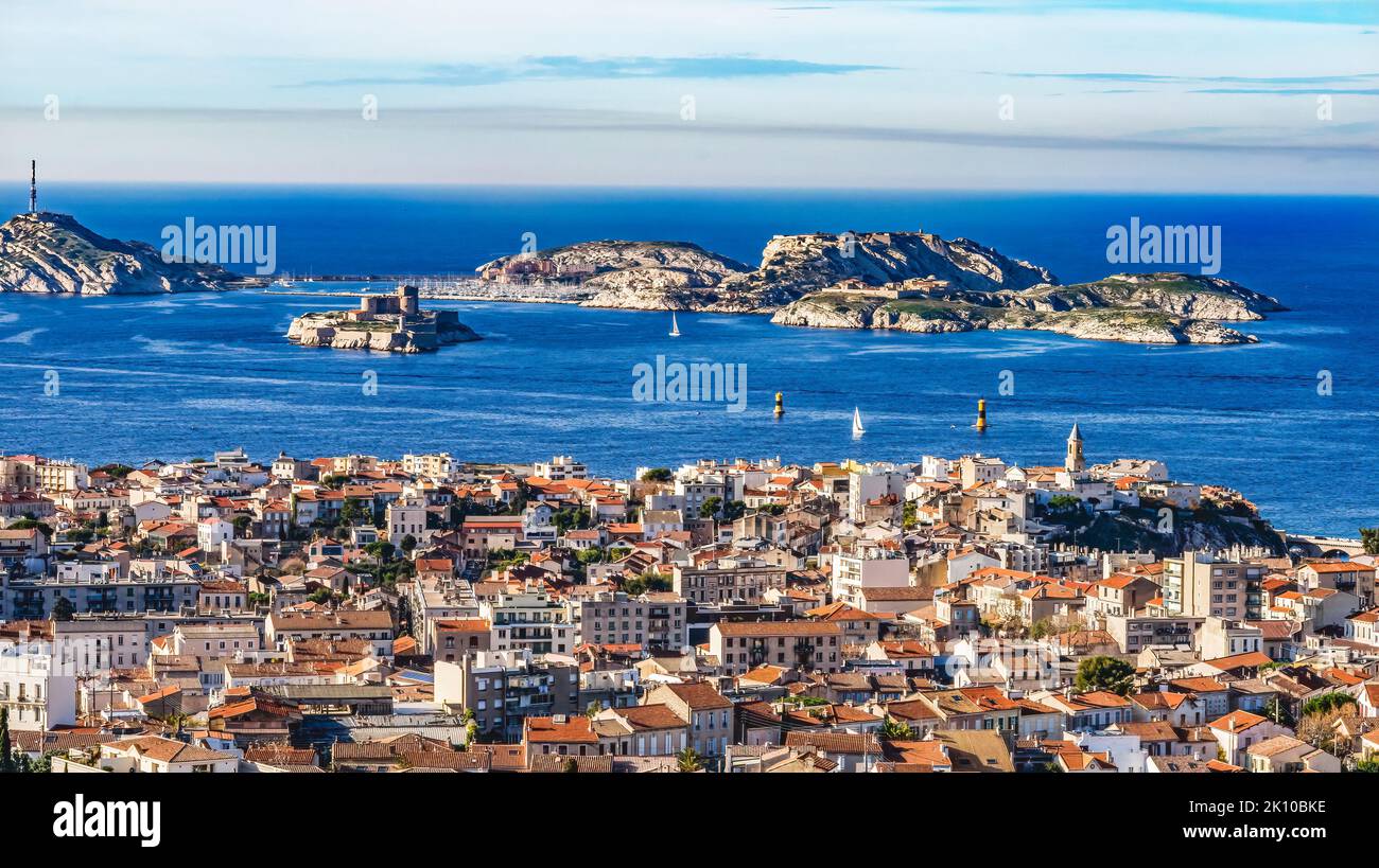 Island Fort Marseille Cityscape Overview Harbor Breakwater Apartment Buildings Marseille Cote d'Azur France. View from Notre Dame Stock Photo