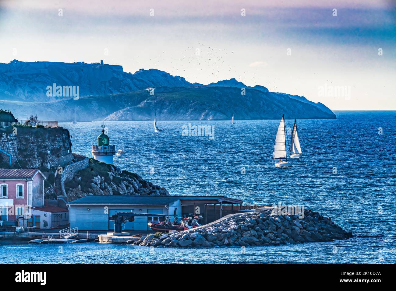 Harbor Lighthouse Sailboats Mediterranean Sea Marseille Cityscape Cote d'Azur France. Stock Photo
