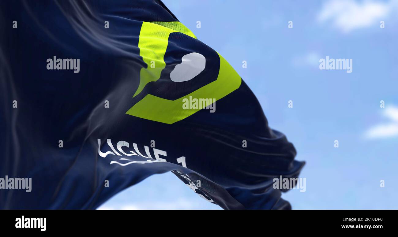 Paris, FRA, July 2022: Ligue 1 flag waving in the wind. Ligue 1 is a French professional league for men association football clubs. Illustrative edito Stock Photo