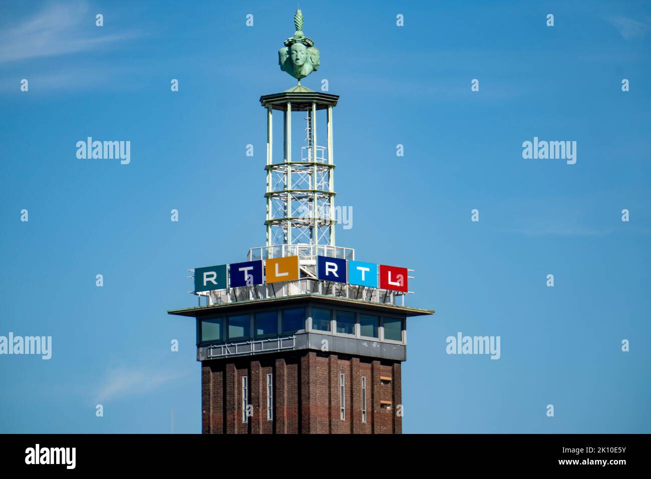 The old trade fair tower of Messe Köln, with RTL logo, at the headquarters of RTL Media Group, Cologne, NRW, Germany, Stock Photo
