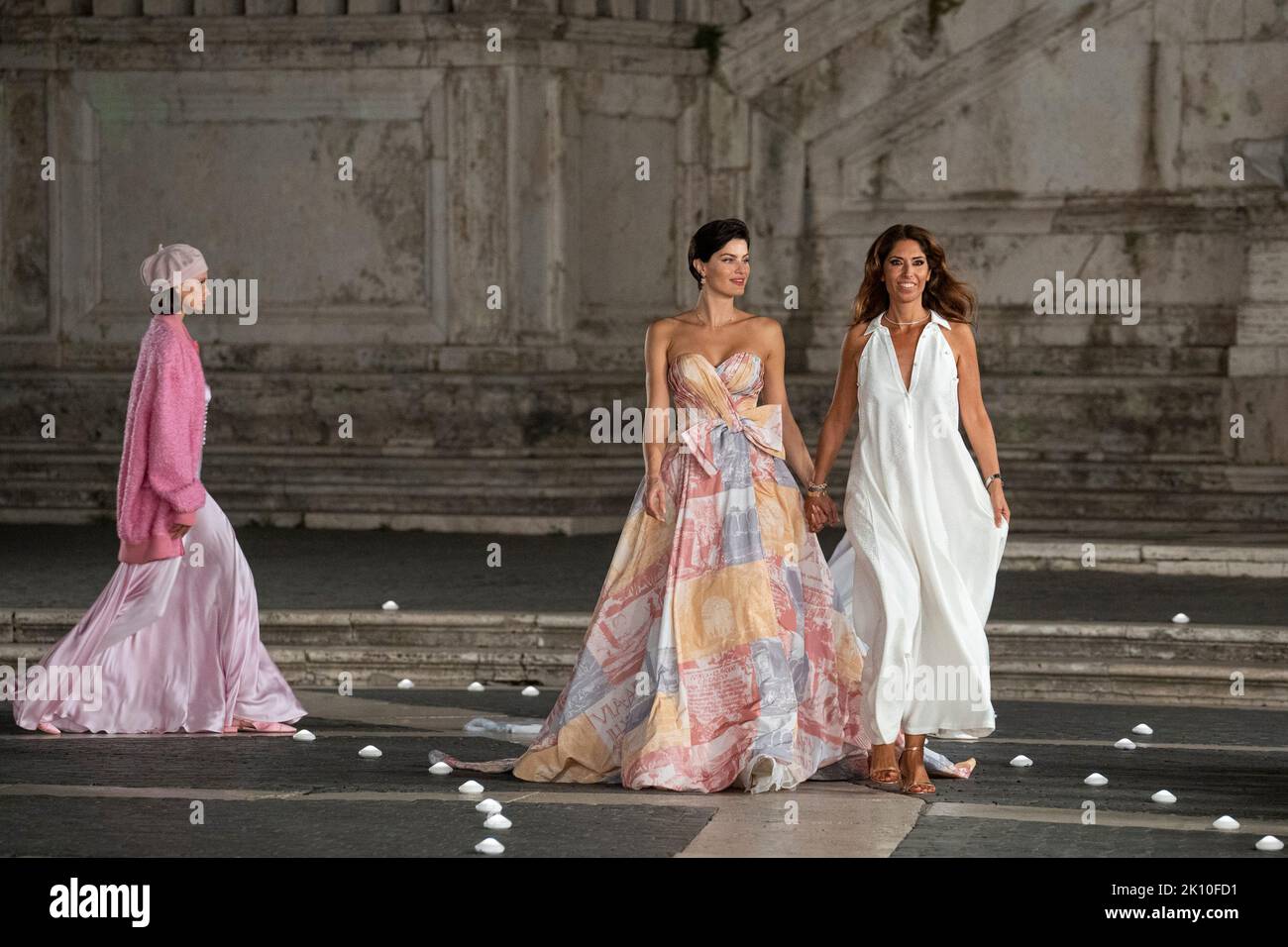 Rome, Italy. 12th Sep, 2022. Lavinia Biagiotti Cigna (R) walks the catwalk prior to the showcase of the Laura Biagiotti fashion show Spring-Summer 2023 collection at Campidoglio Square in Rome. (Photo by Stefano Costantino/SOPA Images/Sipa USA) Credit: Sipa USA/Alamy Live News Stock Photo