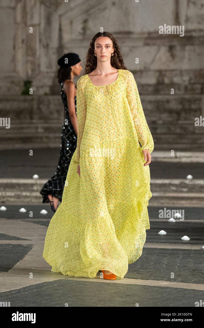 A model walks the runway during the Laura Biagiotti fashion show  Spring-Summer 2023 collection at Campidoglio Square in Rome. (Photo by  Stefano Costantino / SOPA Images/Sipa USA Stock Photo - Alamy