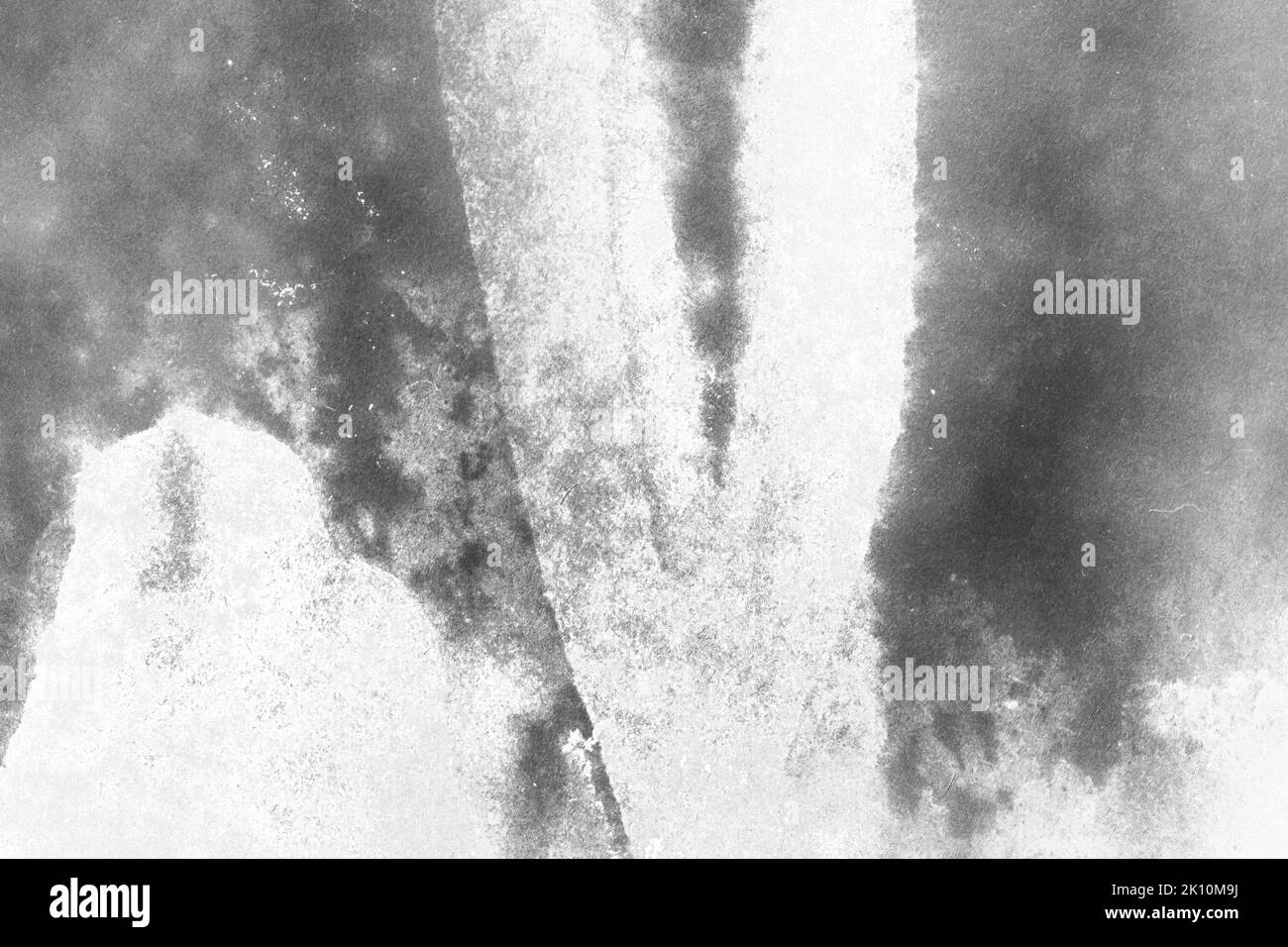 black and white texture of old paper with water stains as a background ...