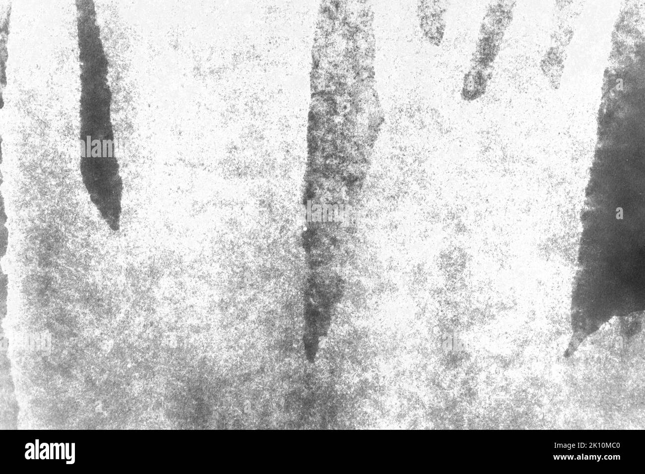 black and white texture of old paper with water stains as a background ...