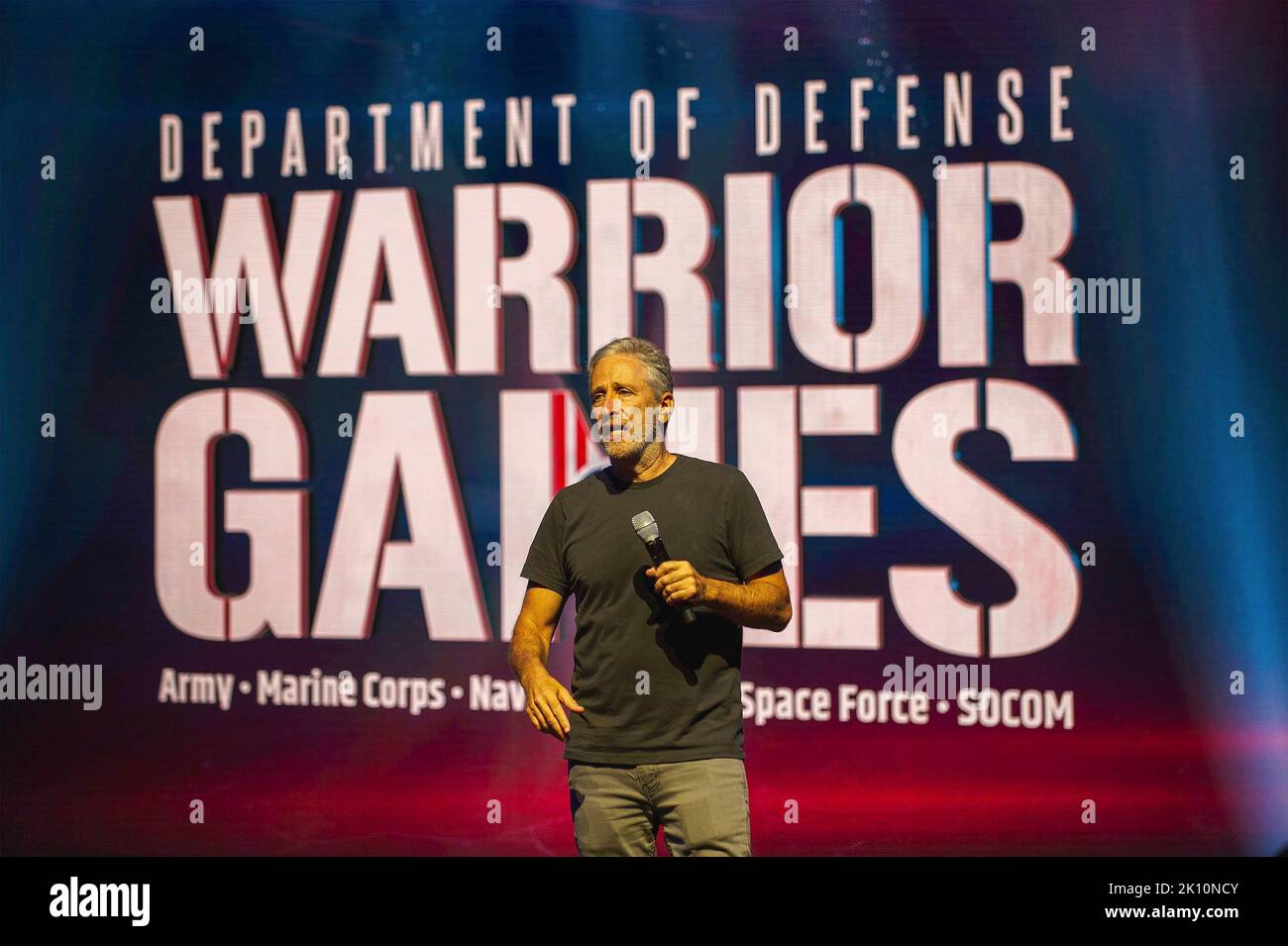 Orlando, United States of America. 19 August, 2022. Comedian and military activist Jon Stewart hosts the 2022 Department of Defense Warrior Games opening ceremony at Walt Disney World Resort, August 19, 2022 in Orlando, Florida.  Credit: Sgt. Henry Villarama/DOD Photo/Alamy Live News Stock Photo