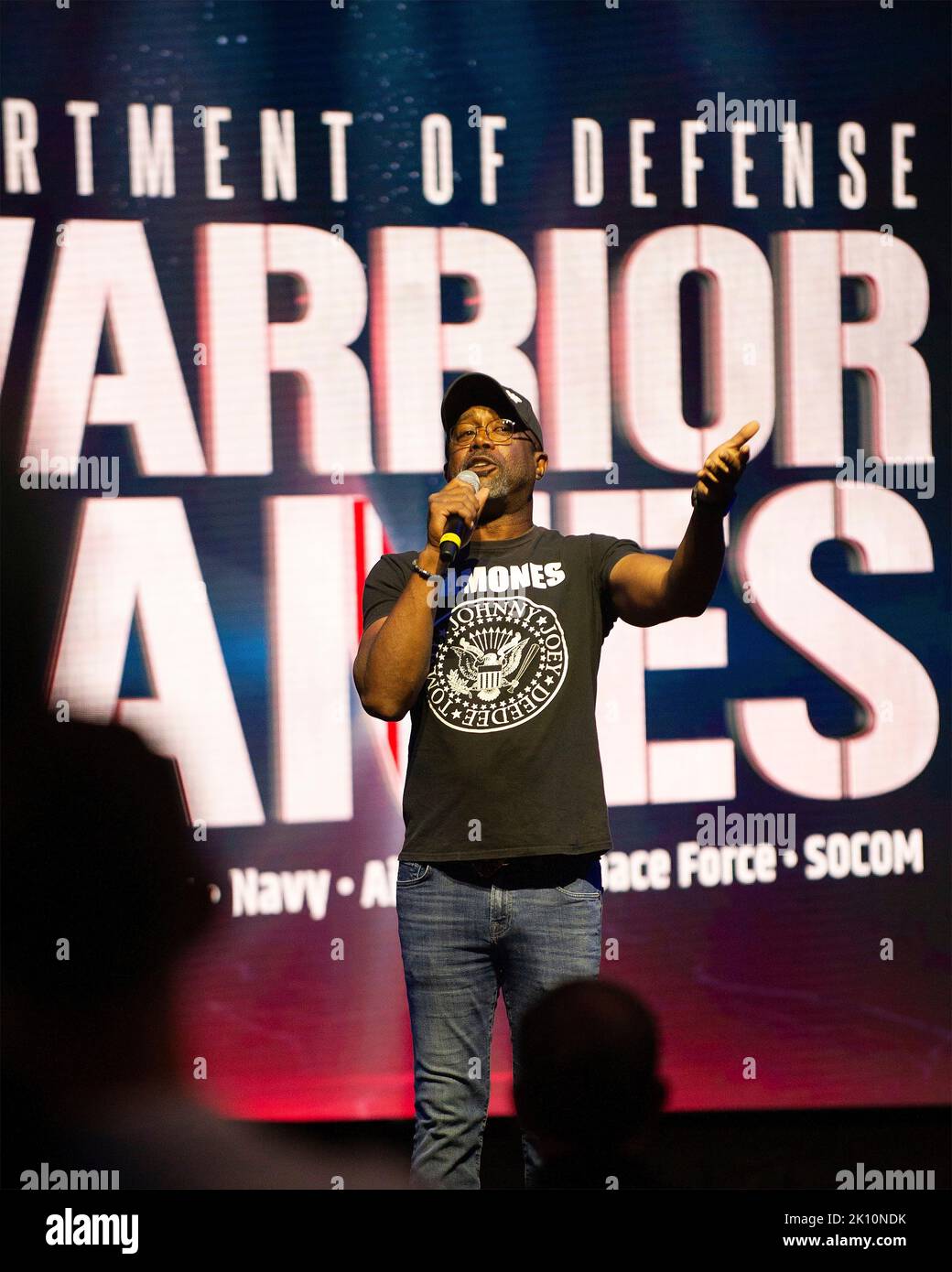 Orlando, United States of America. 19 August, 2022. Country music singer, Darius Rucker, delivers remarks during the 2022 Department of Defense Warrior Games opening ceremony at Walt Disney World Resort, August 19, 2022 in Orlando, Florida.  Credit: Sgt. Henry Villarama/DOD Photo/Alamy Live News Stock Photo