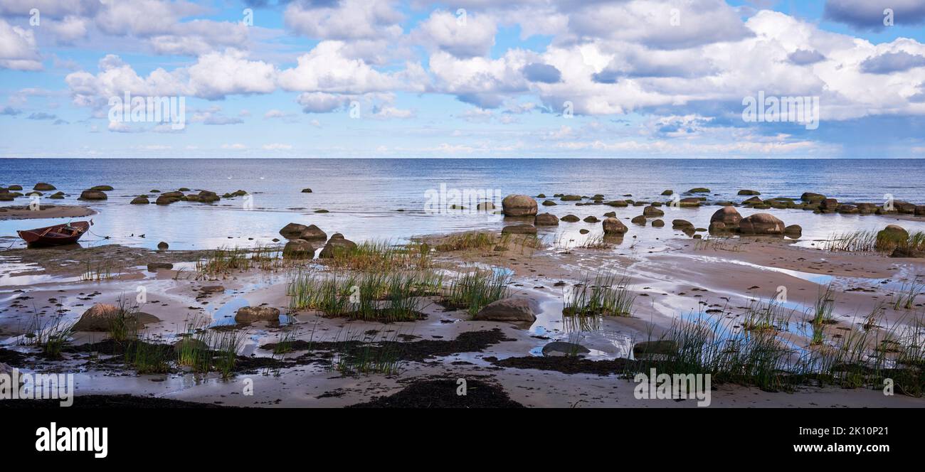 Seaside rocks and shallow waters in Kaltene coastline, Latvia Stock Photo