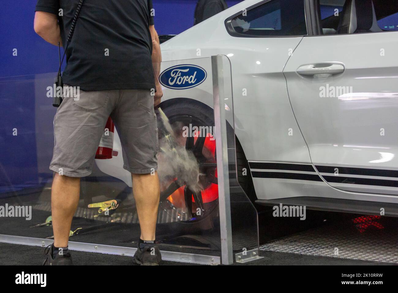 Detroit, Michigan, USA. 14th Sep, 2022. A Ford Shelby GT 500 caught fire while running on a dynamometer in a simulated drag racing area at the North American International Auto Show. Credit: Jim West/Alamy Live News Stock Photo