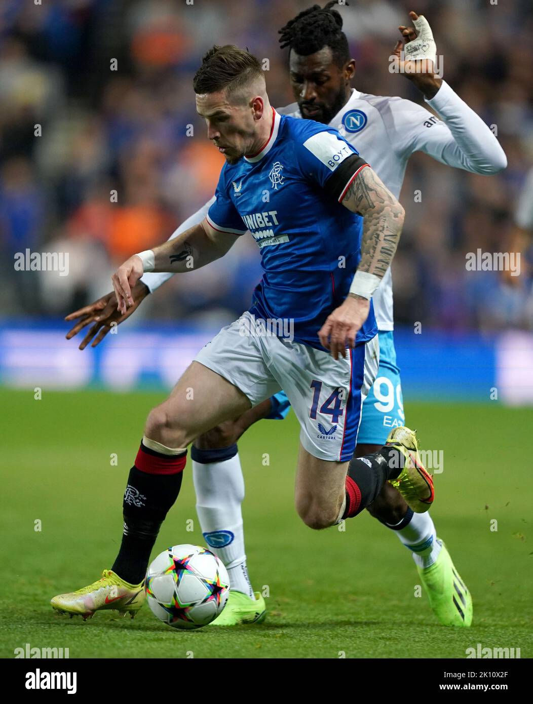 Rangers' Ryan Kent (left) and Napoli's Andre-Frank Zambo Anguissa in action during the UEFA Champions League Group A match at Ibrox Stadium, Glasgow. Picture date: Wednesday September 14, 2022. Stock Photo