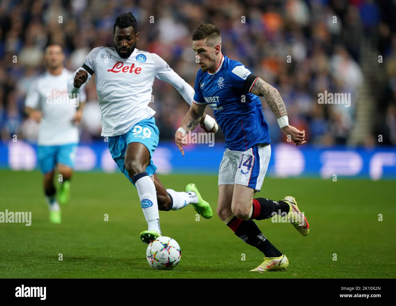 Rangers' Ryan Kent (right) and Napoli's Andre-Frank Zambo Anguissa in action during the UEFA Champions League Group A match at Ibrox Stadium, Glasgow. Picture date: Wednesday September 14, 2022. Stock Photo