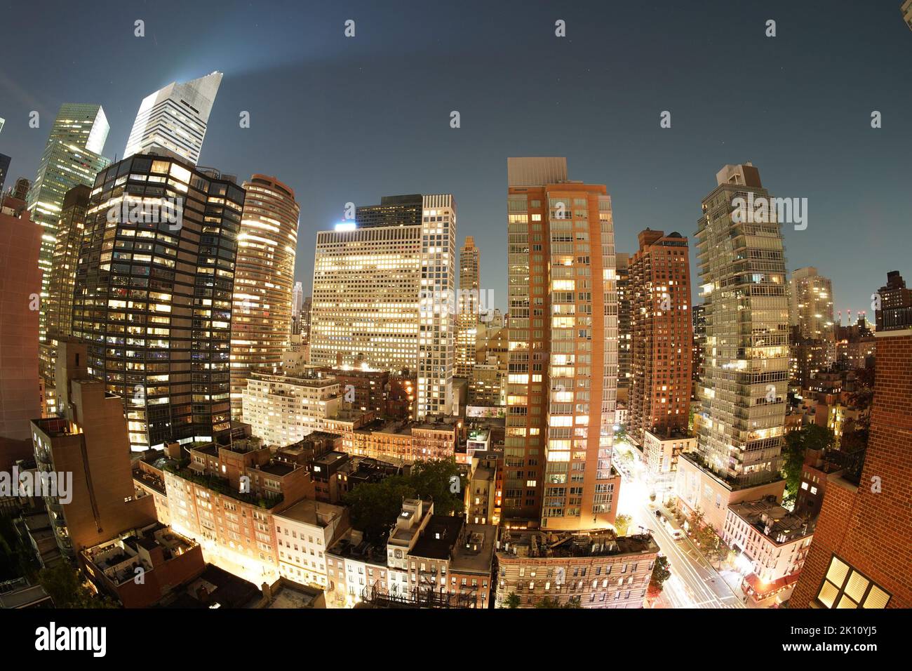 Manhattan new york city night aerial cityscape from terrace rooftop