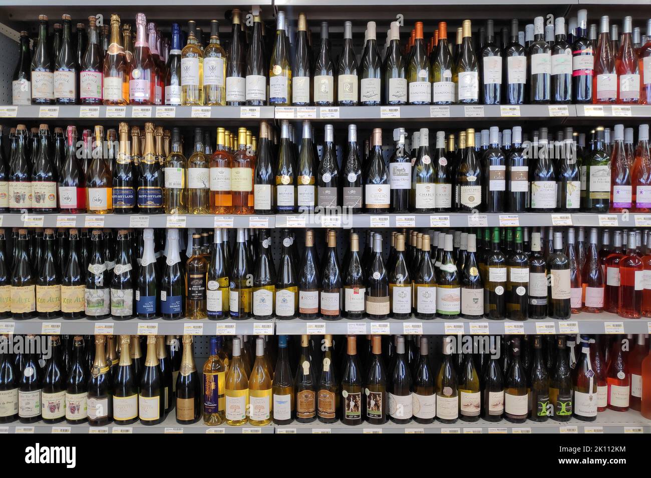 Morlaix, France - March 30 2022: Shelves of a store filled with French wines. Stock Photo
