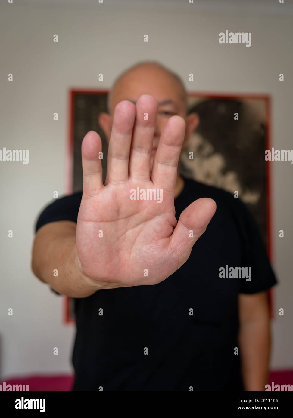 A senior man practicing martial arts indoor Stock Photo Alamy