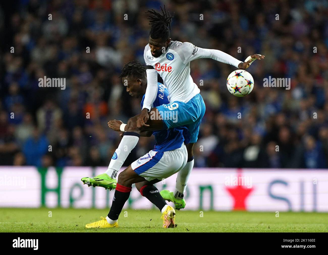 Rangers' Rabbi Matondo (left) and Napoli's Andre-Frank Zambo Anguissa battle for the ball during the UEFA Champions League Group A match at Ibrox Stadium, Glasgow. Picture date: Wednesday September 14, 2022. Stock Photo