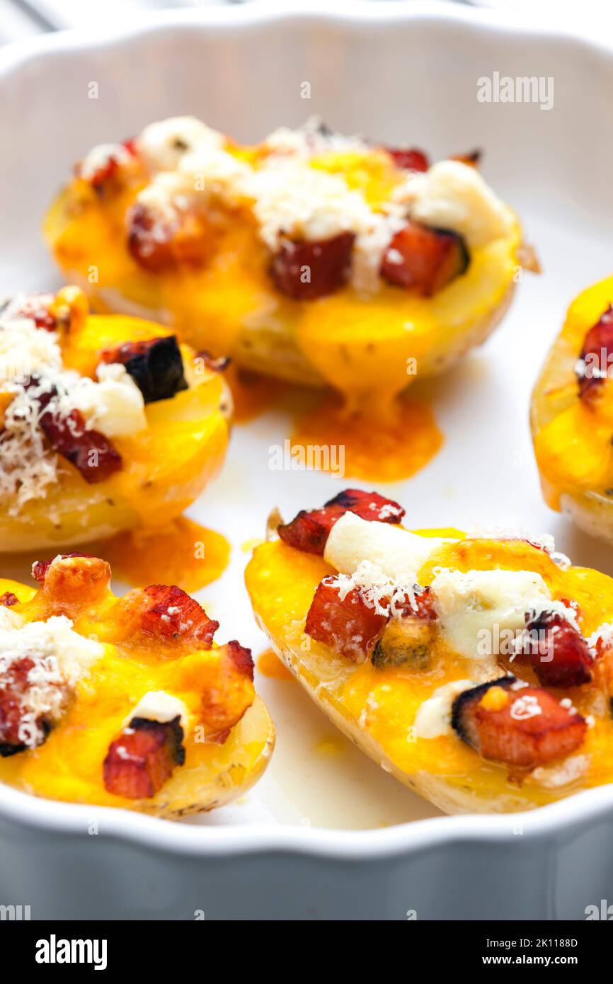 baked potatoes filled with cheese and bacon Stock Photo Alamy