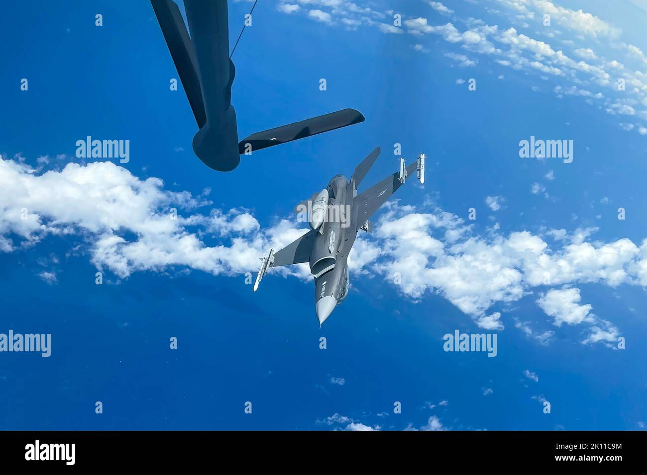 U.S. Air Force F-16 Fighting Falcon from the South Carolina Air National Guard’s, 157th Fighter Squadron refuels with the U.S Air Force KC-135 unit from the 92nd Air Refueling Wing during Relampago VII, an exercise in Barranquilla, Colombia, Aug. 30, 2022. The purpose of this exercise is to provide the Colombian Air Force with requested realistic interoperability training as allied countries, under NATO standards. South Carolina is Colombia’s State Partner in the State Partnership Program. (U.S. Air National Guard photo by Master Sgt. Nicole Szews, 169th Fighter Wing Public Affairs) Stock Photo
