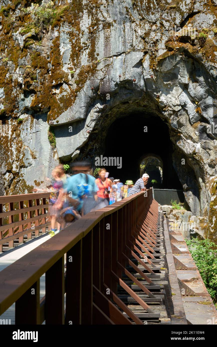 Hope, British Columbia, Canada – June 30, 2019. Coquihalla Canyon Provincial Park Tunnels. People visiting Coquihalla Canyon Park. Stock Photo