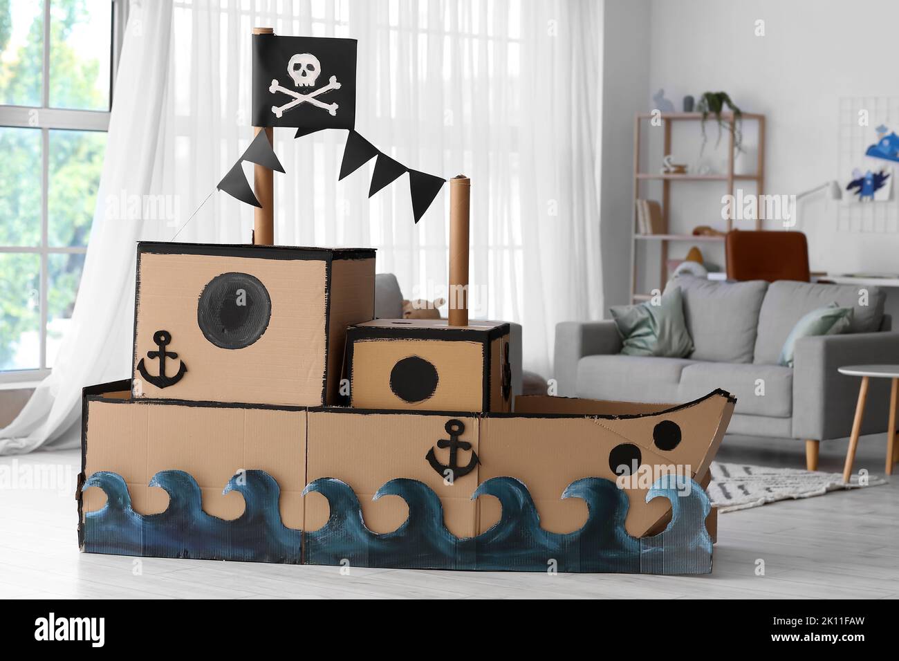 Cardboard pirate ship in living room Stock Photo - Alamy