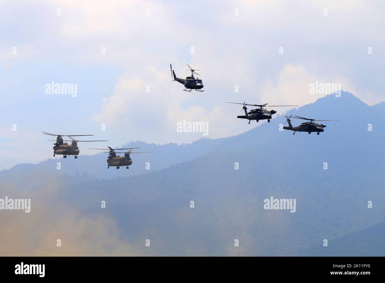 Formation of UH-1,CH-47 and UH-60 helicopter of JGSDF in Higashi-Fuji Exercise area Shizuoka Japan Stock Photo