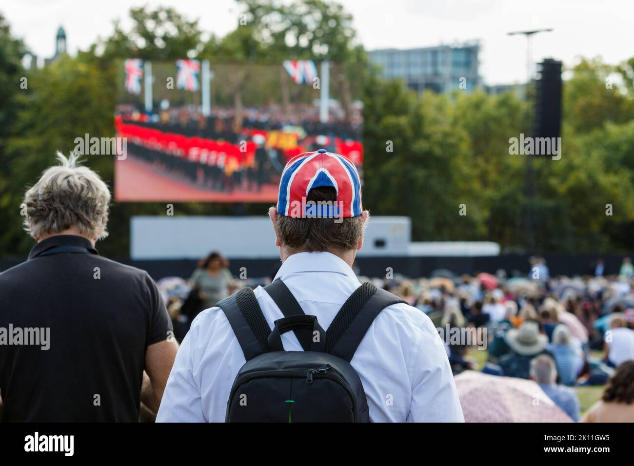 London, UK. 14th Sep, 2022. As crowds of people came to London to watch Her Majesty the Queen's coffin being transported to the Palace of Westminster, large numbers of people are pictured watching the event on large video screens in Hyde Park, London. Credit: Lynchpics/Alamy Live News Stock Photo