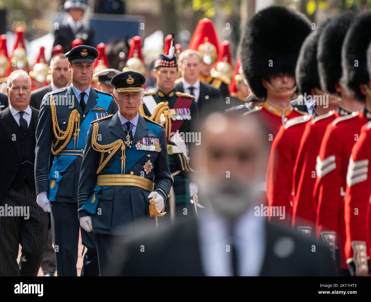 © Jeff Moore King Charles III , the Prince of Wales walk behind the Queen’s coffin from Buckingham Palace to Westminster Hall for the lying in state Stock Photo