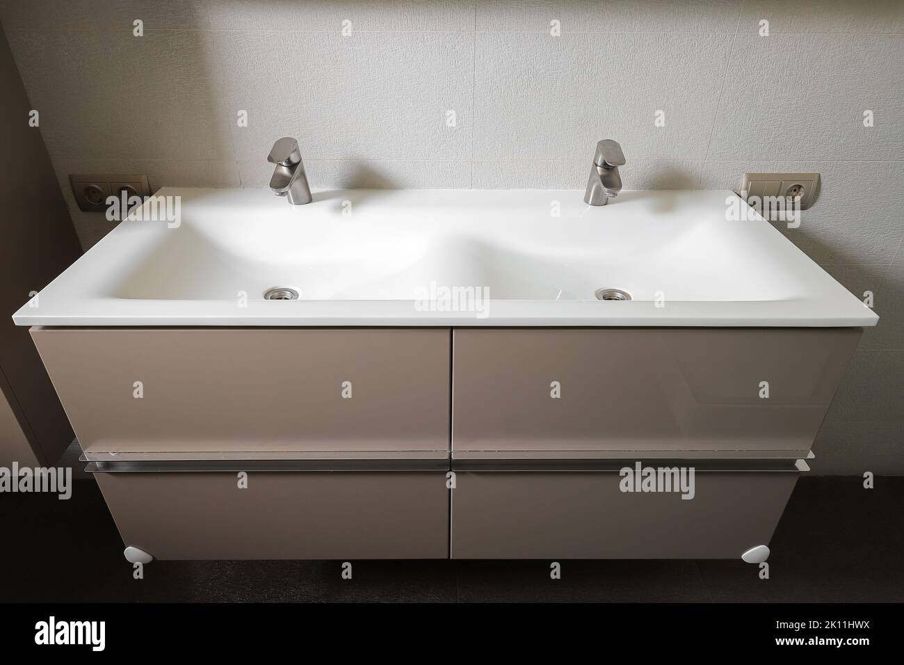 Double washbasin with two taps in the bathroom interior Stock Photo Alamy