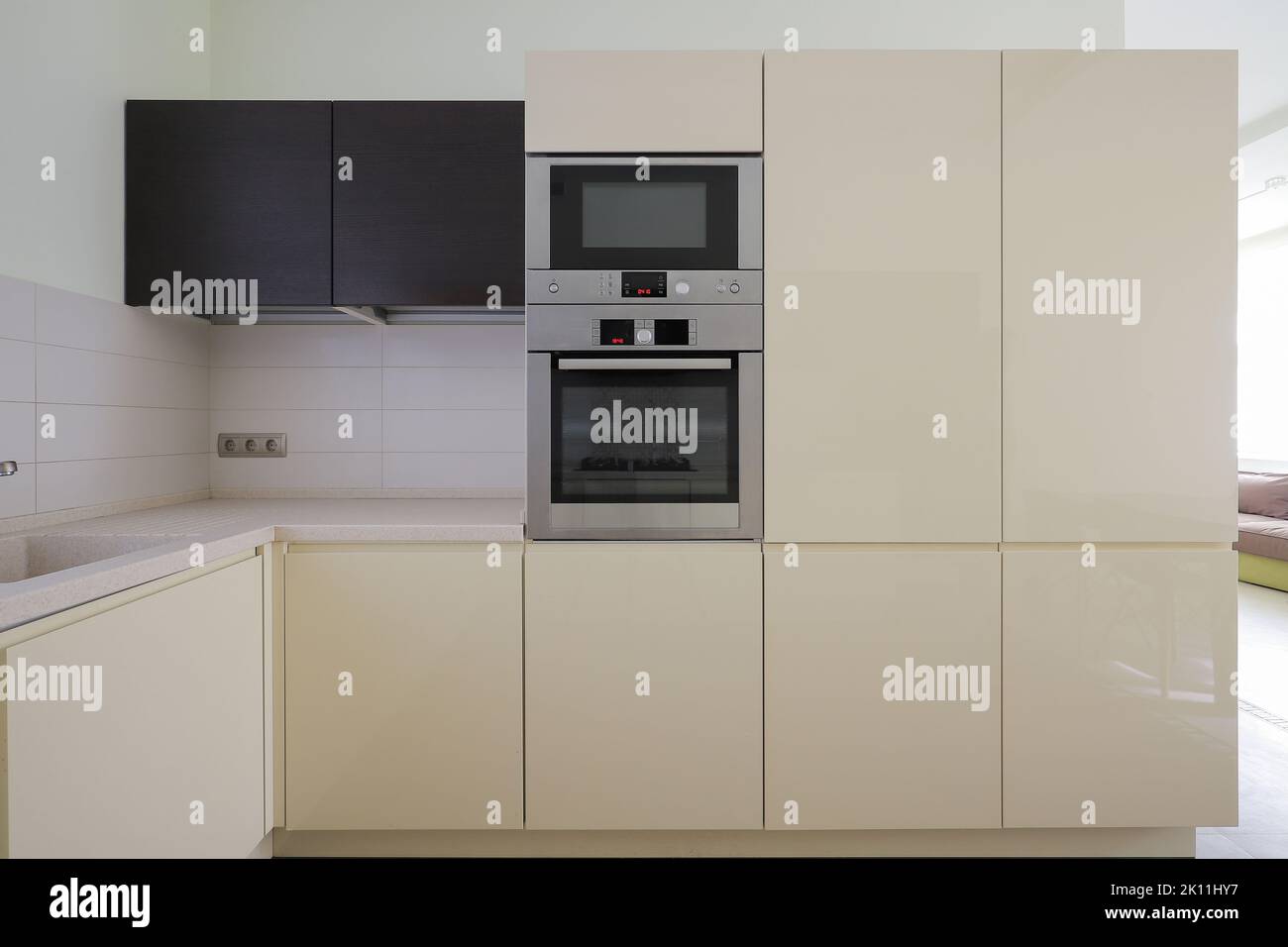 Modern microwave and oven built-in kitchen furniture Stock Photo