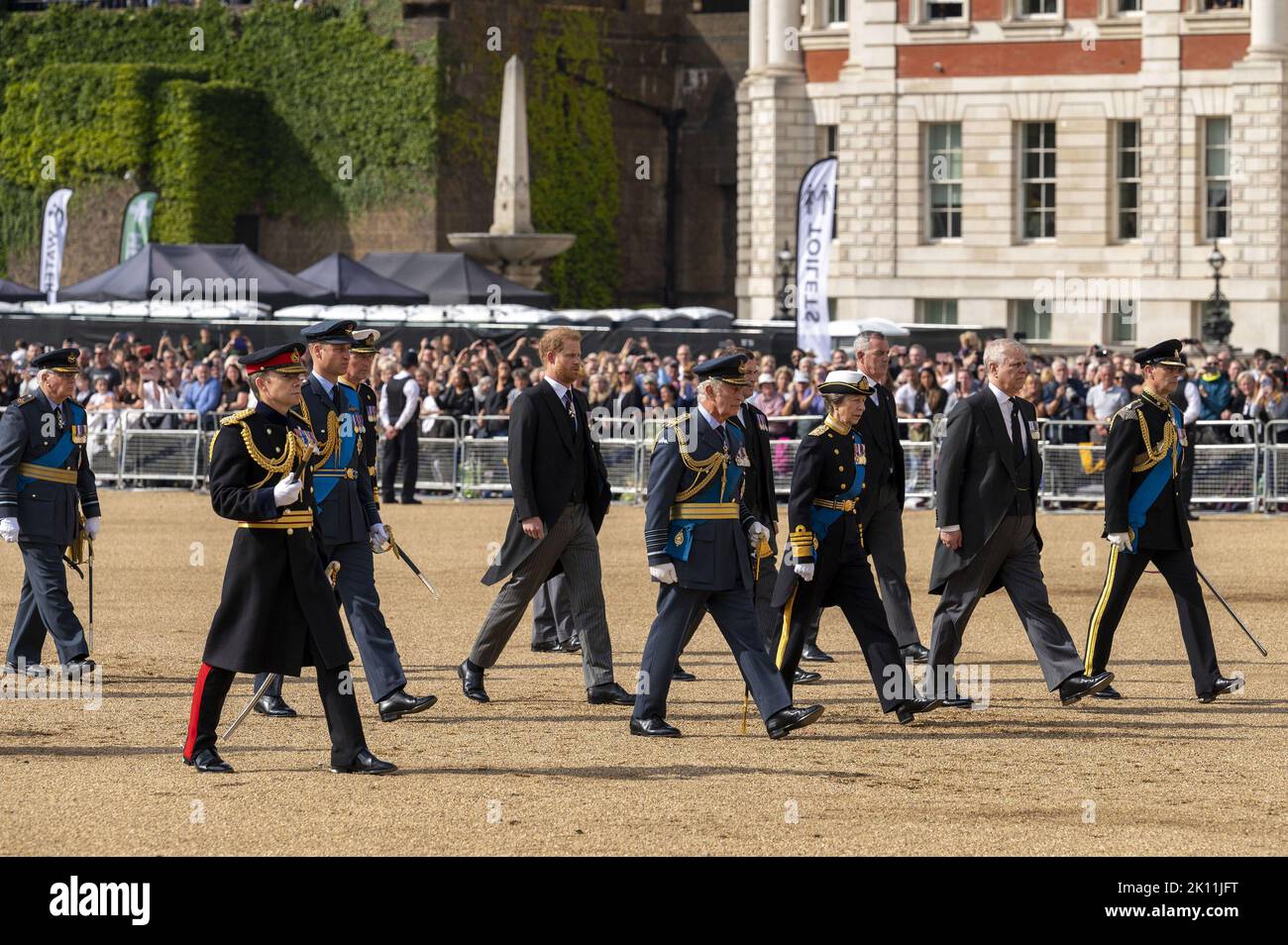 (L/R): Prince William, Prince of Wales, Prince Harry, King Charles III, Duke of Sussex, Princess Anne, Princess Royal and Vice-Admiral Sir Timothy Laurence walk behind the coffin of Queen Elizabeth II, adorned with a Royal Standard and the Imperial State Crown and pulled by a Gun Carriage of The King's Troop Royal Horse Artillery, during a procession from Buckingham Palace to the Palace of Westminster, in London on Wednesday on September 14, 2022, where the coffin of Queen Elizabeth II, will Lie in State. Queen Elizabeth II will lie in state in Westminster Hall inside the Palace of Westminster Stock Photo