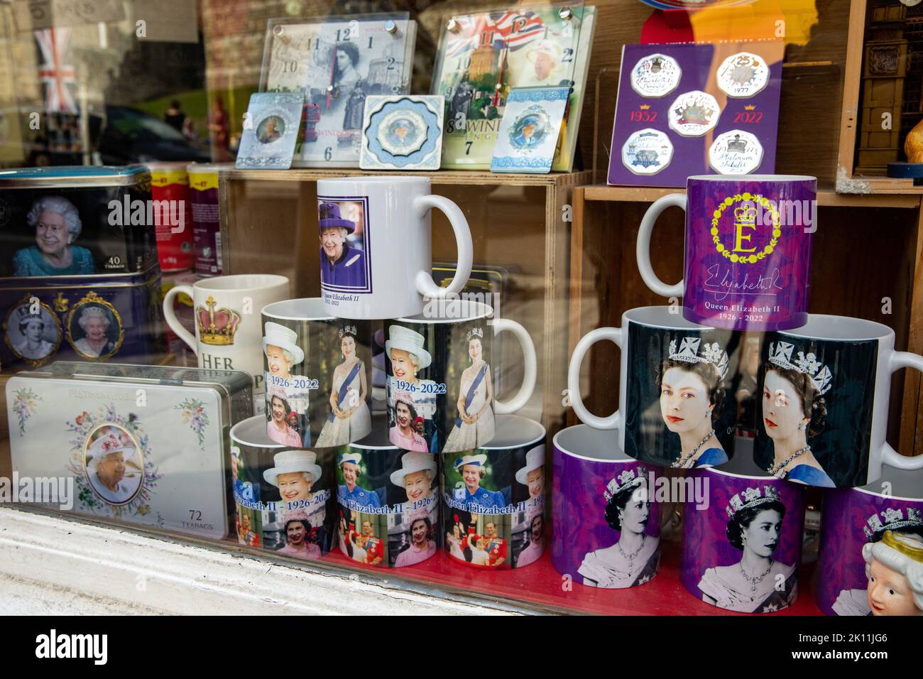 Windsor, UK. 14th September, 2022. Souvenirs of Queen Elizabeth II are displayed in a shop window. Queen Elizabeth II, the UK's longest-serving monarch, died at Balmoral aged 96 on 8th September after a reign lasting 70 years and will be buried in the King George VI memorial chapel in Windsor following a state funeral in Westminster Abbey on 19th September. Credit: Mark Kerrison/Alamy Live News Stock Photo