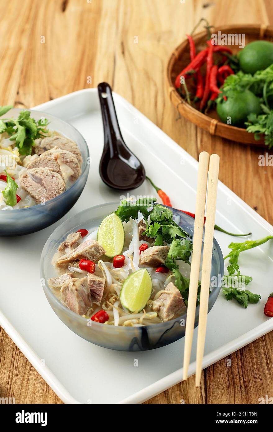 Pho Bo, Vietnamese Fresh Rice Noodle Soup with Beef, Herbs, and Chili ...