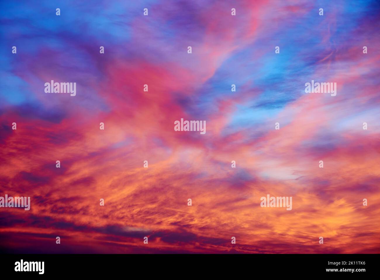 Dramatic pink and blue sunset sky with clouds. Abstract nature ...