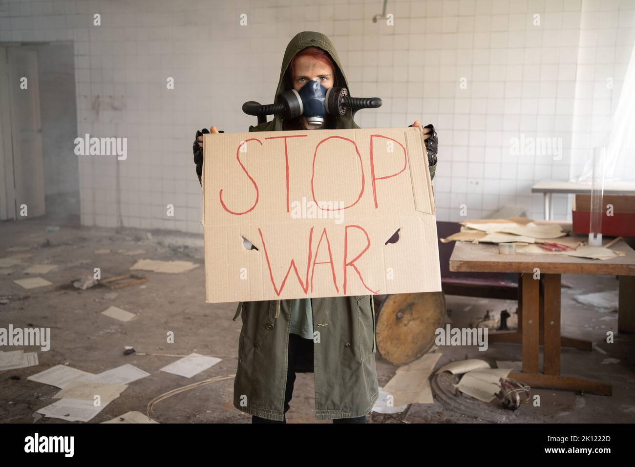 Woman holding No War placard with sign in protest manifestation against ...