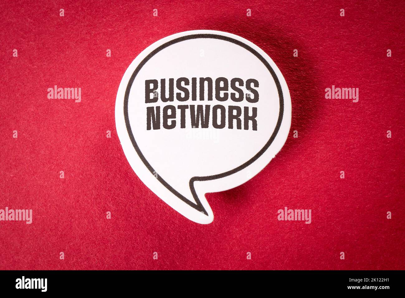 Business Network. Speech bubble with text on red background. Stock Photo