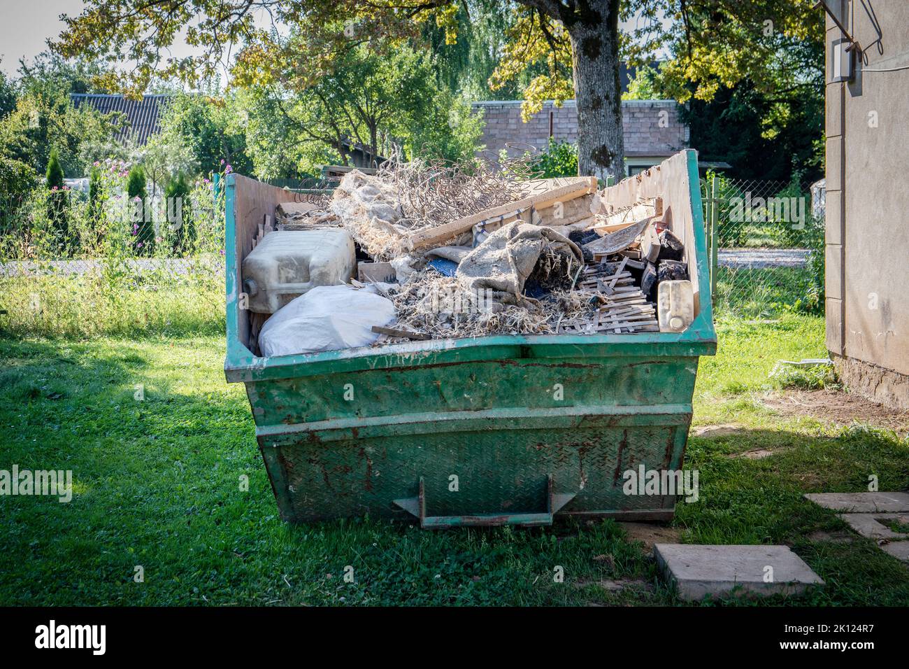 Large container for construction debris and waste. Stock Photo