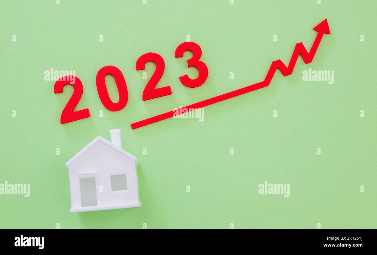 Real estate market inflation and price increase in year 2023, House and graph arrow up. Economic growth Stock Photo