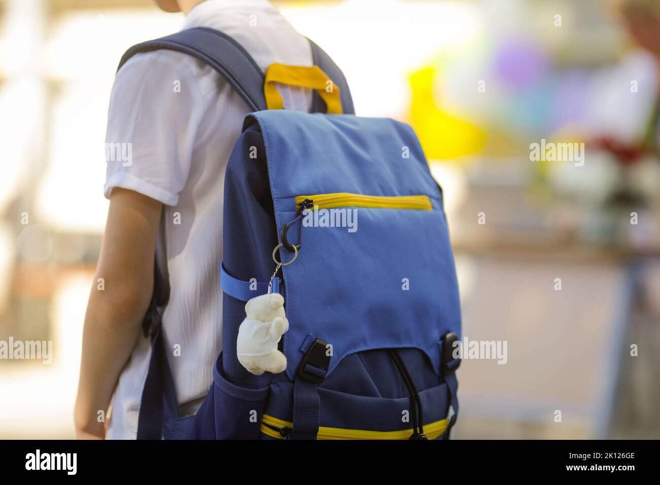 Ukrainian children start a new year of school. Details with a boy’s backpack. Stock Photo