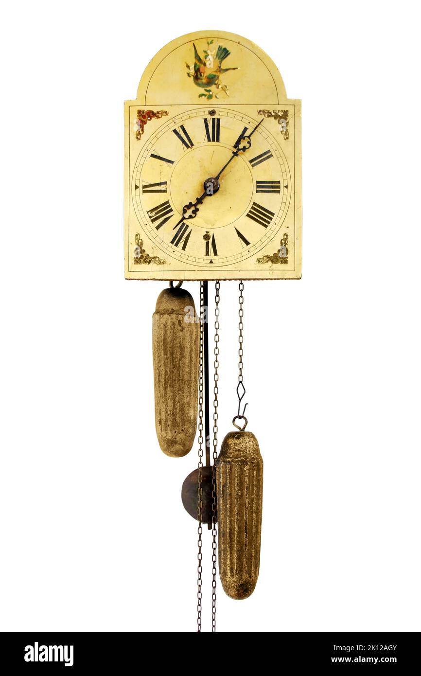 Antique wall clock isolated, with iron pendular, made in 1879, (focus on center) Stock Photo