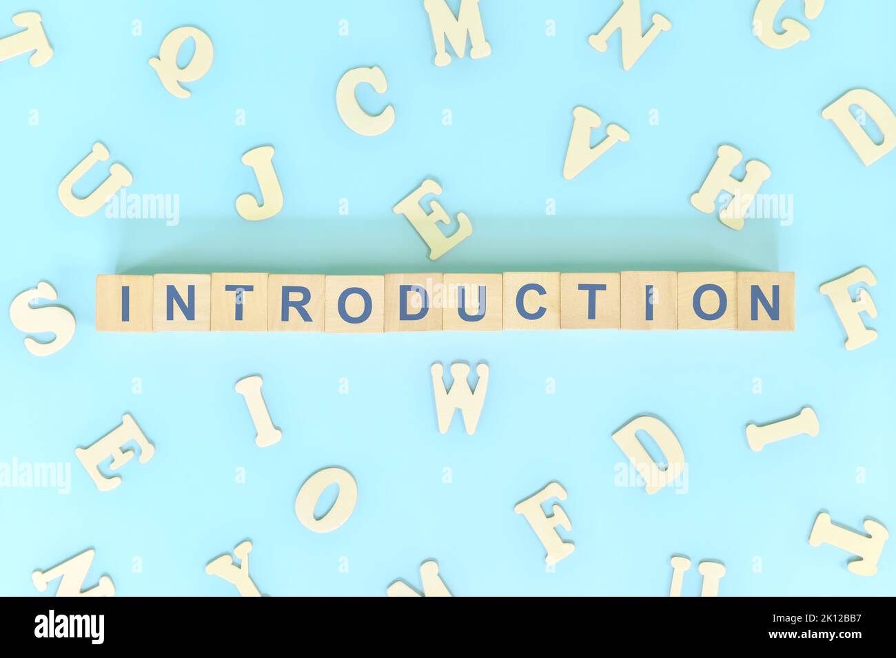 Introduction part of a book concept. Wooden blocks typography word flat ...