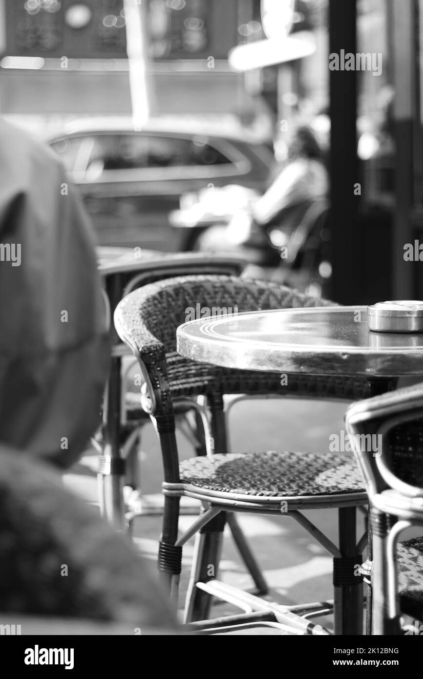Classic French Cafe. Parisian Cafe Terrace with Wicker Chairs. Travel
