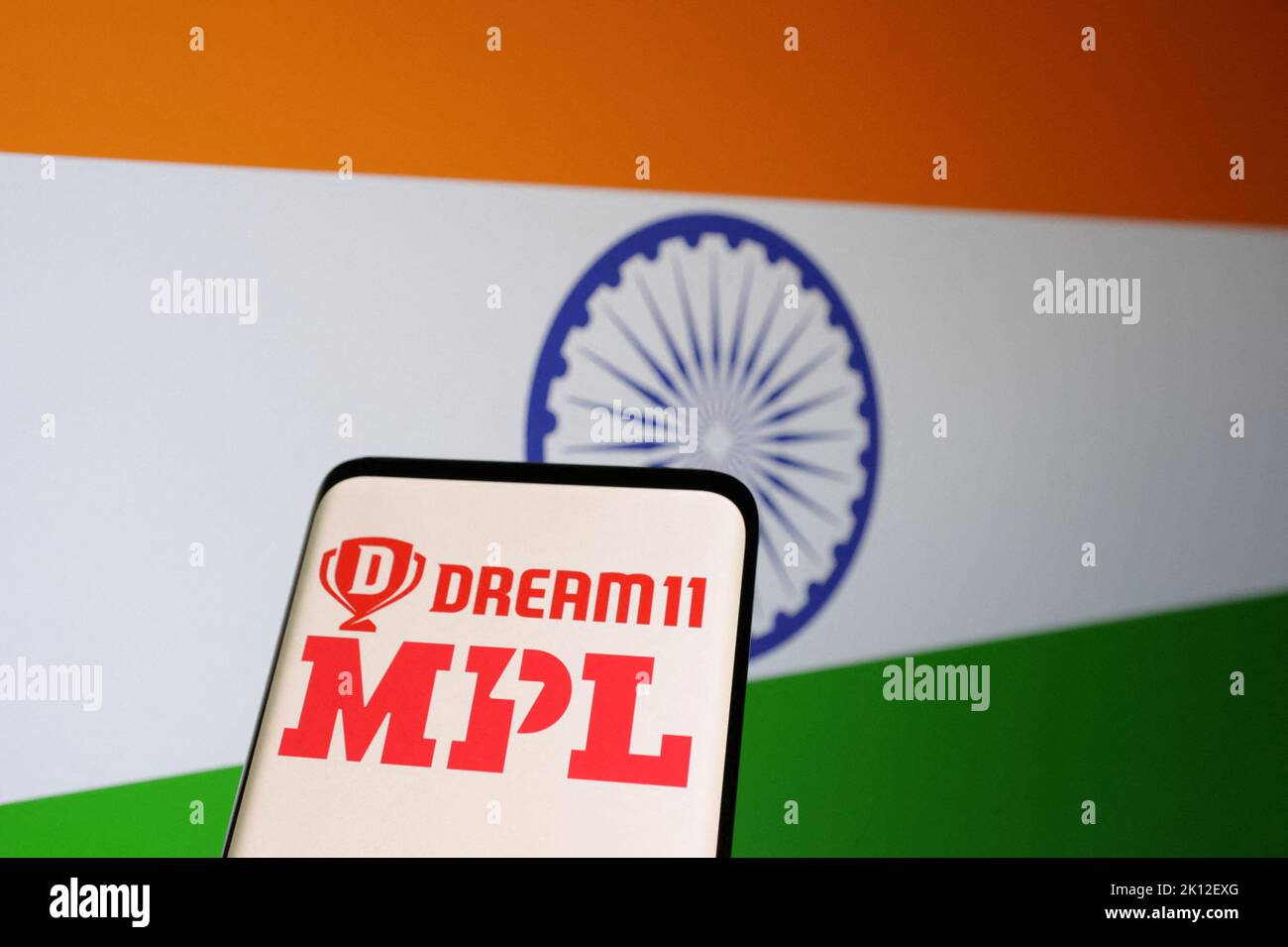 Dream11 and MPL logos are displayed in front of the Indian flag in this Illustration taken September 14, 2022. REUTERS/Dado Ruvic/Illustration Stock Photo