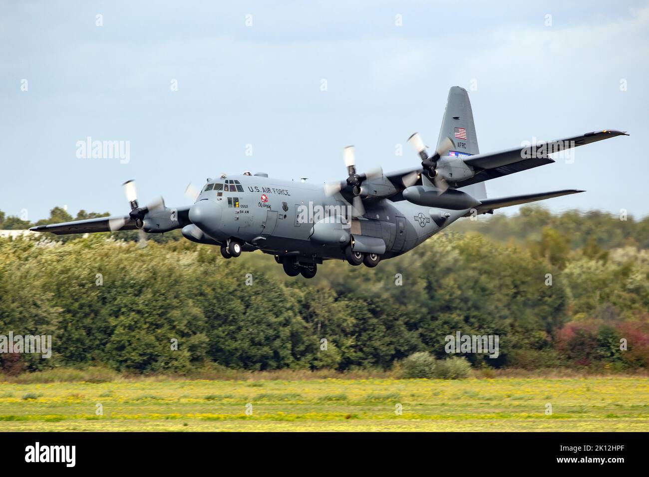 US Air Force Lockheed C-130H Hercules transport plane from 94th Airlift Wing landing on Eindhoven airbase. The Netherlands - September 22, 2018 Stock Photo