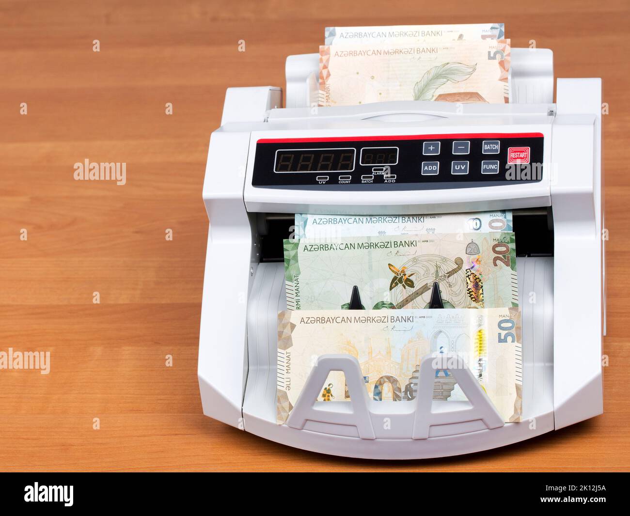 Azerbaijani money - Manat in a counting machine Stock Photo