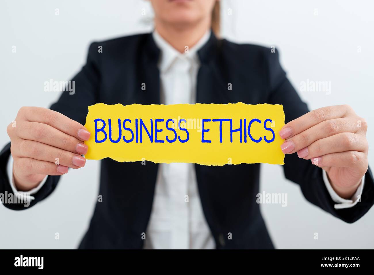 Handwriting text Business EthicsMoral principles that guide the way a business behaves. Business approach Moral principles that guide the way a Stock Photo