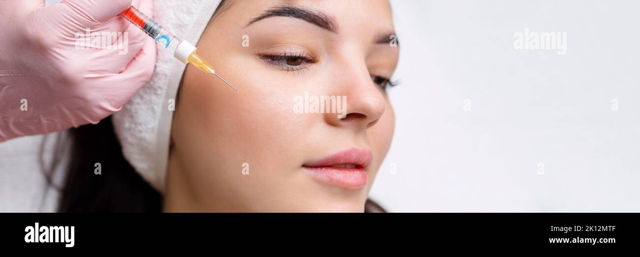 beauty injections into beautiful face. smoothing of mimic wrinkles